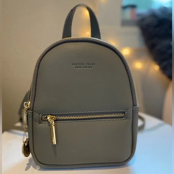 Forever Young | Bags | Mini Backpack New Never Used | Poshmark display picture 3